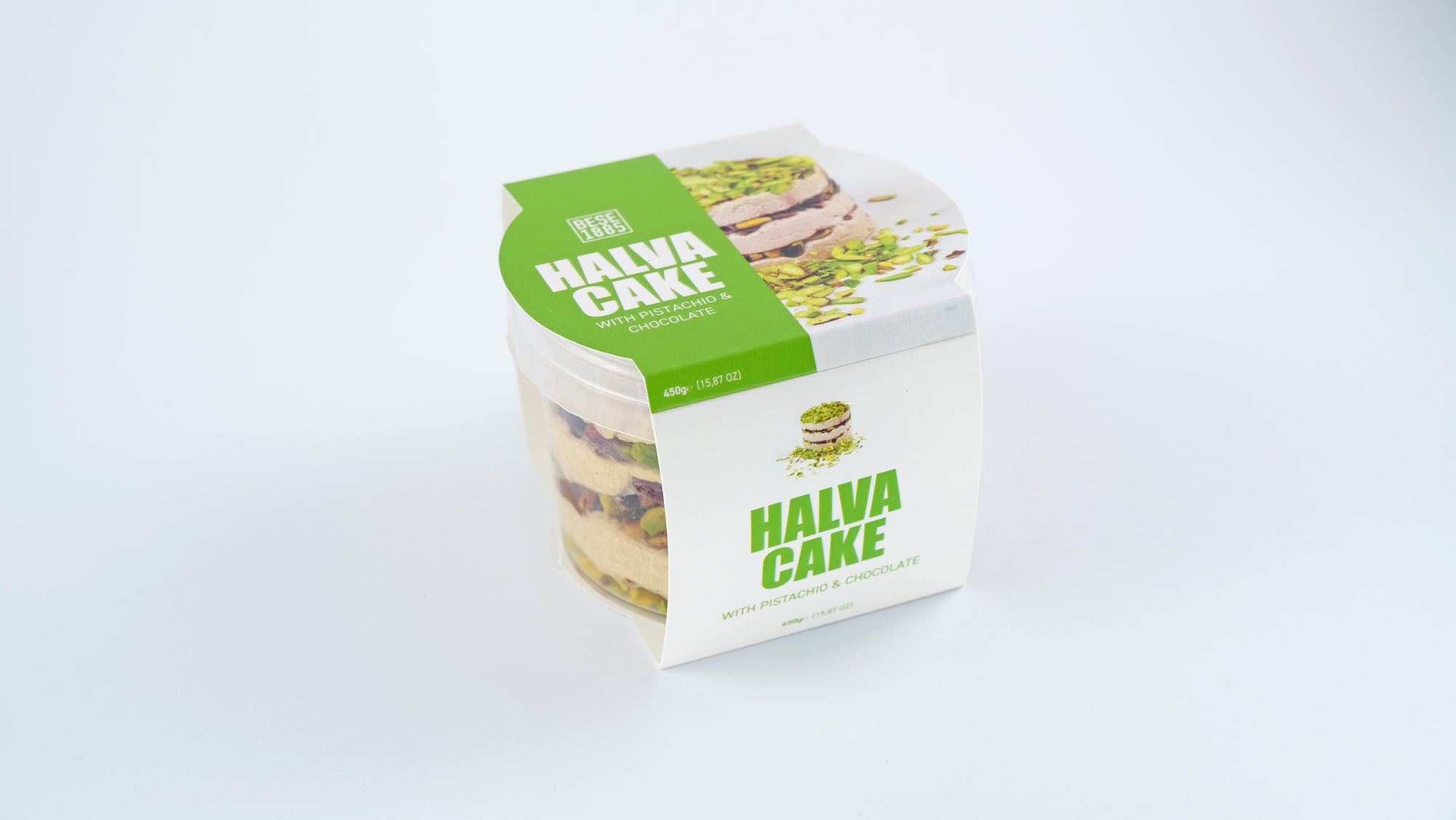 Premium Halva Cake – Pistachio & Chocolate – 450g in branded angled packaging
Premium Halva Cake – Pistache & Chocolade – 450g in schuine merkverpakking
Premium Halva-Kuchen – Pistazie & Schokolade – 450g in schräger Markenverpackung
