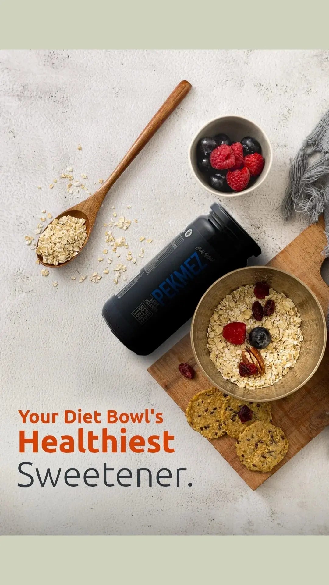 Oats, berries, and PEKMEZ sweetener arranged for a healthy diet breakfast bowl.