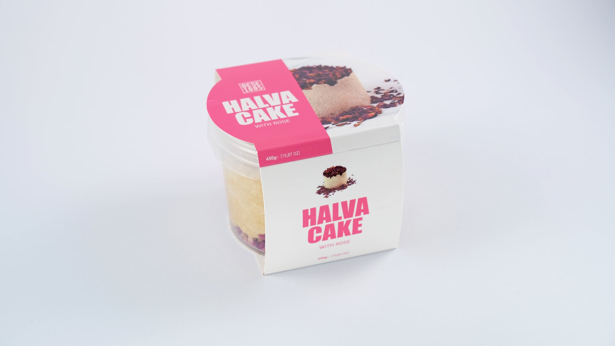 Front view of Premium Halva Cake – Delicate Rose Aroma – 450g in branded jar and box

Vooraanzicht van Premium Halva Cake – Rozenaroma – 450g in merkverpakking

Vorderansicht des Premium Halva-Kuchens – Rosenaroma – 450g in Markenverpackung
